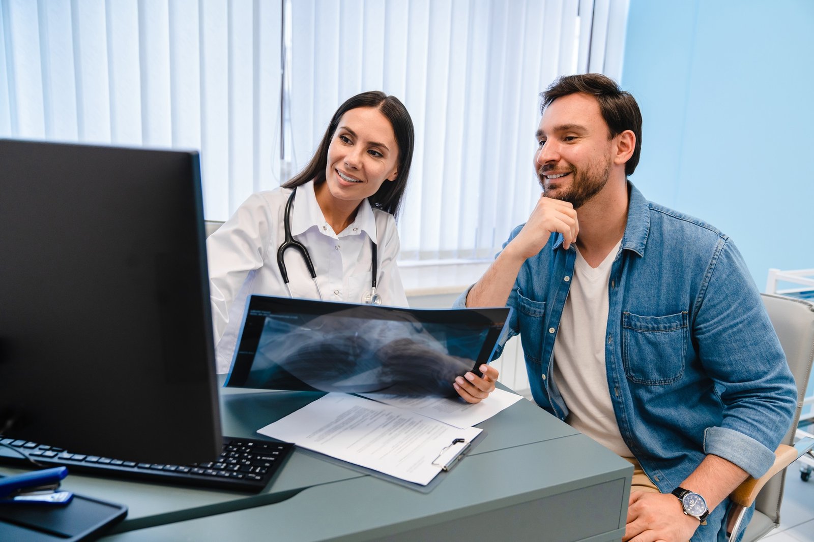 Doctor diagnosing patient's health with radiological chest x-ray film for medical healthcare service